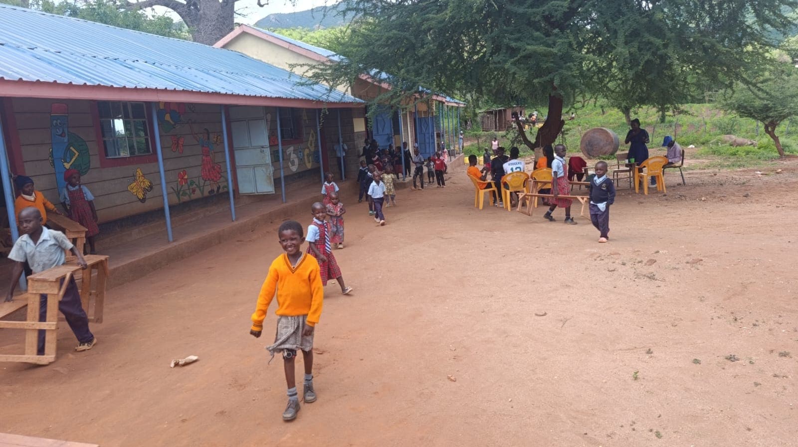A sponsored child thriving at Kakunguu School