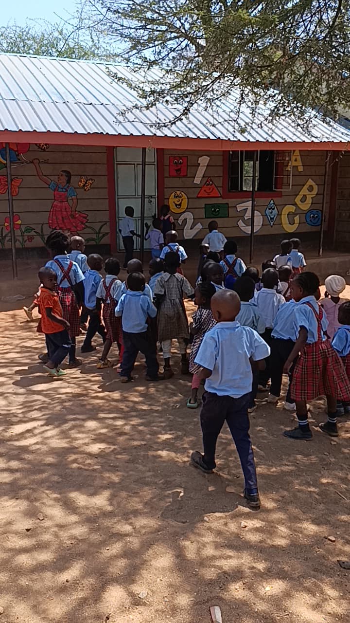 A sponsored child thriving at Kakunguu School